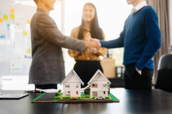 Customers who choose to buy a condominium room and a bank approve a loan for their purchase. Condominium and house loan interest rate from bank concept in office